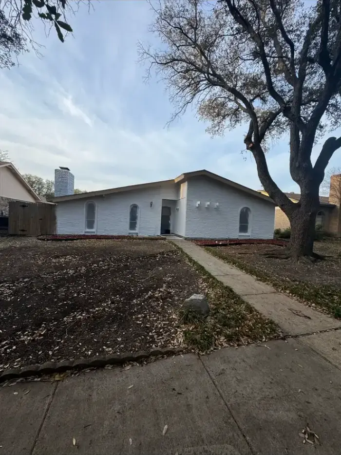Freshly painted single-story home exterior by RGS General Contracting