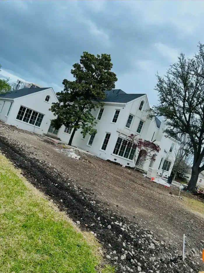 Freshly painted two-story home exterior by RGS General Contracting
