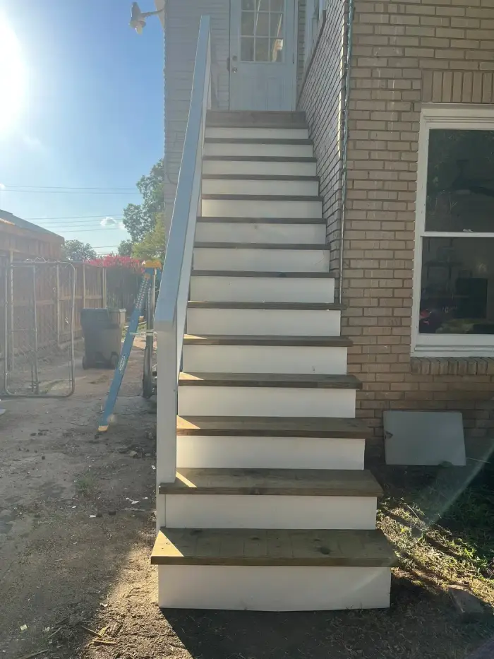New exterior staircase construction on a two-story building by RGS General Contracting